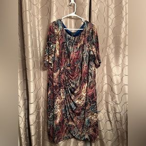 Connected Apparel, never been worn, multicolored, asymmetrical dress.